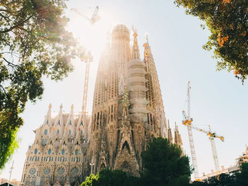 Exterior of the Sagrada Família in Barcelona in evening sunlight