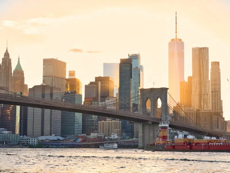 The Brooklyn Bridge and Manhattan skyline at sunset