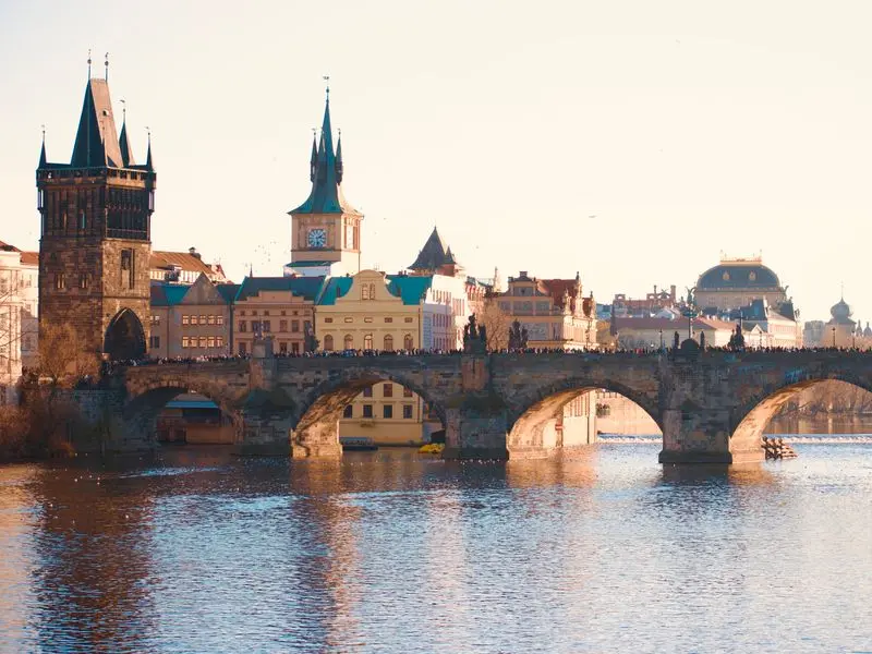 Charles Bridge and the Old Town bridge tower in Prague at golden hour